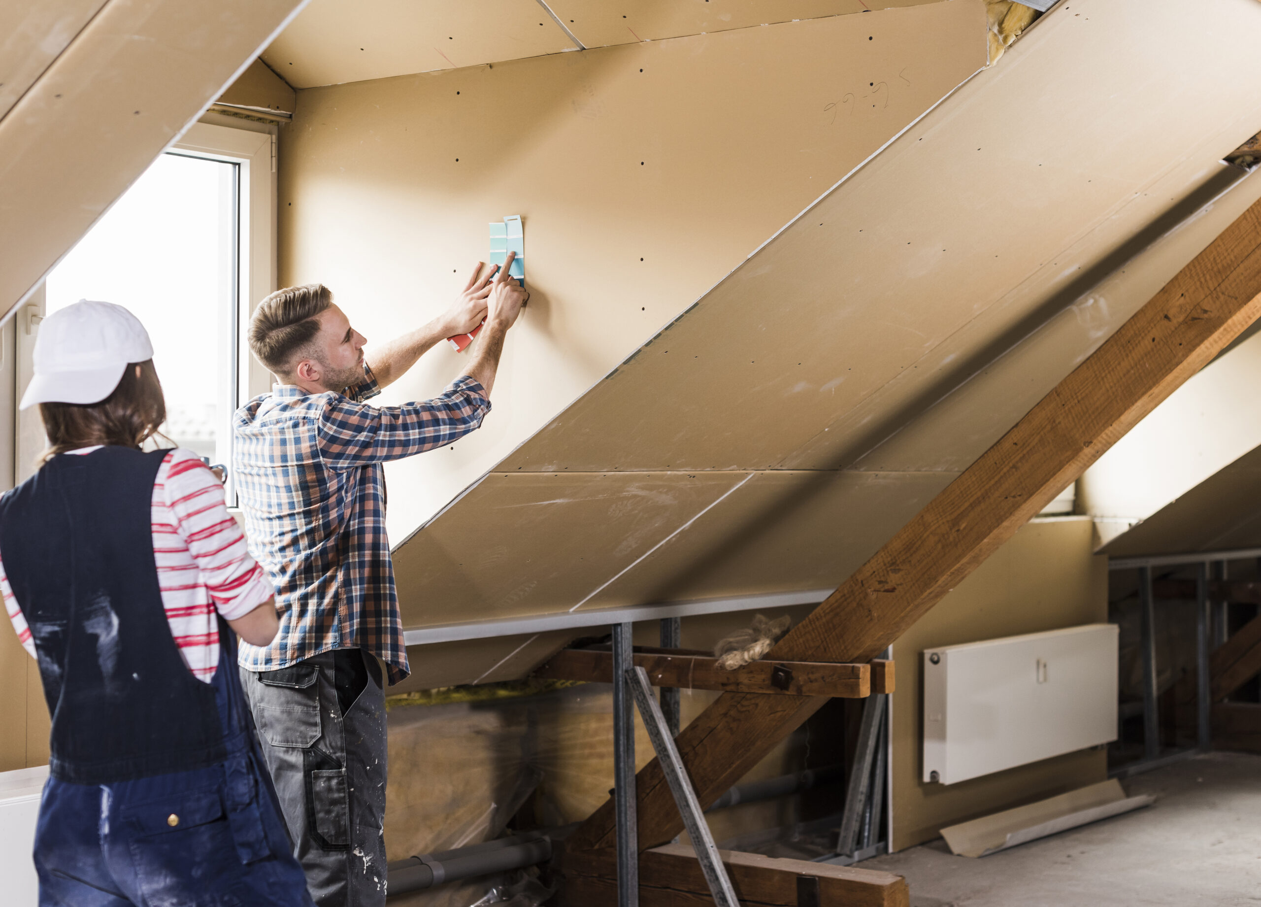 Young couple renovating their new home